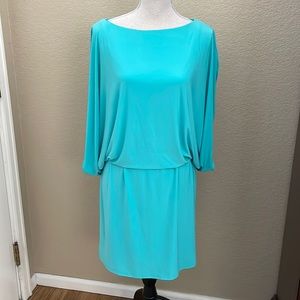 Turquoise Jersey blouson dress.